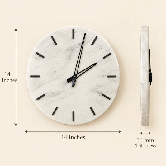Round white marble wall clock with black hour markers and hands
