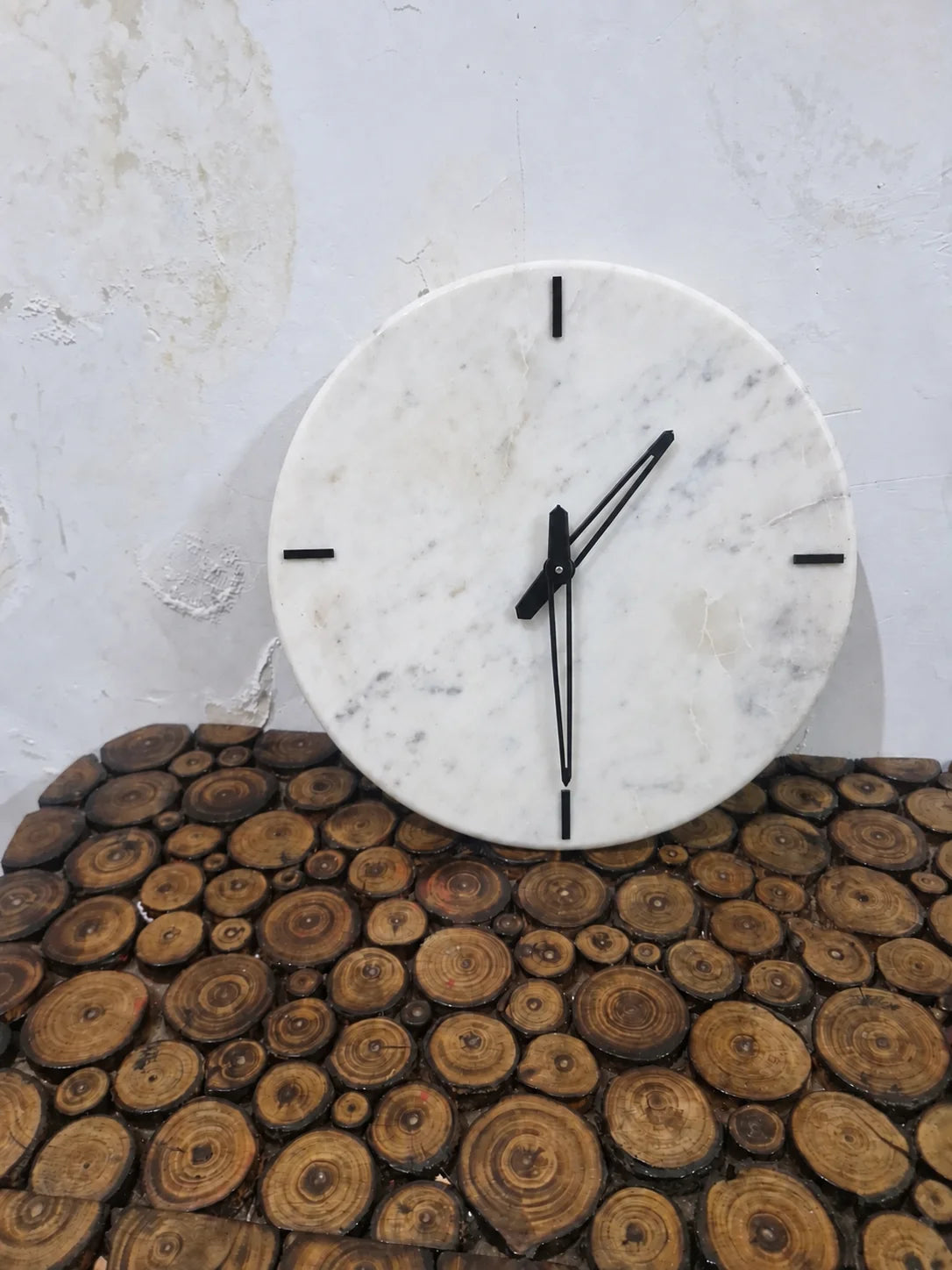 White Marble Wall Clock with Black Quarter Markers
