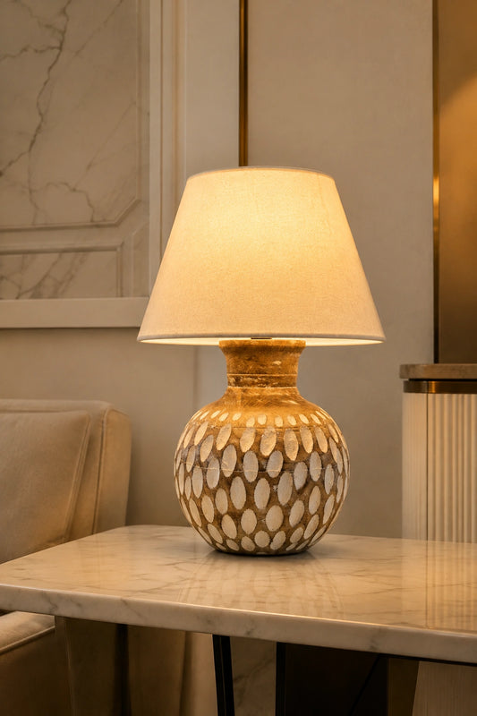 Brown wooden patterned table lamp with white shade by Reggal Decors