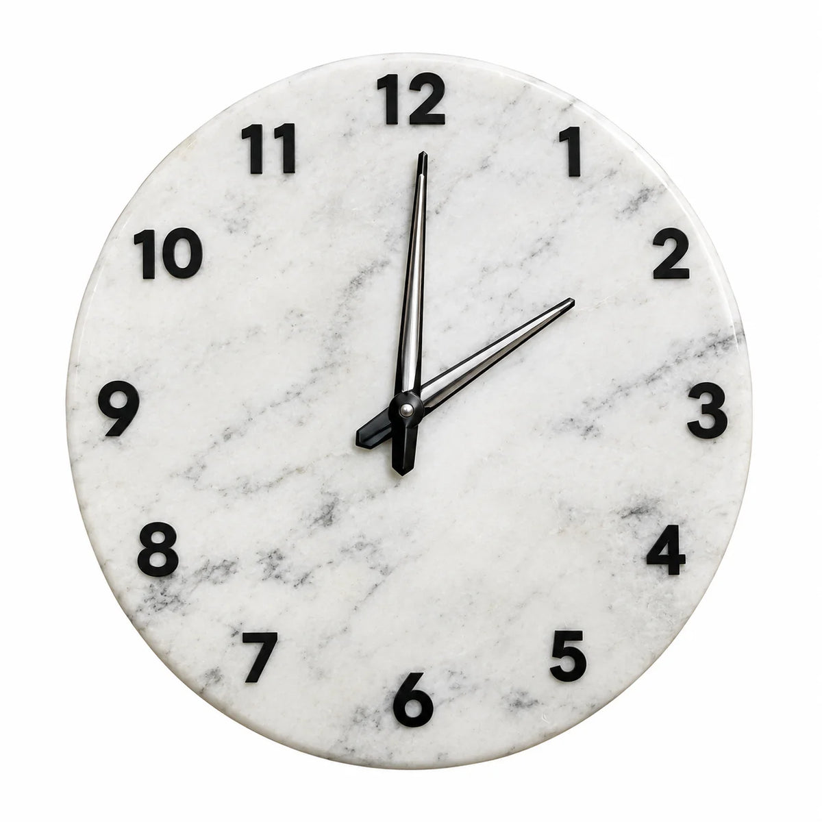 Close-up of a round white marble wall clock featuring natural grey marble veining, raised black numbers, and sleek black clock hands.